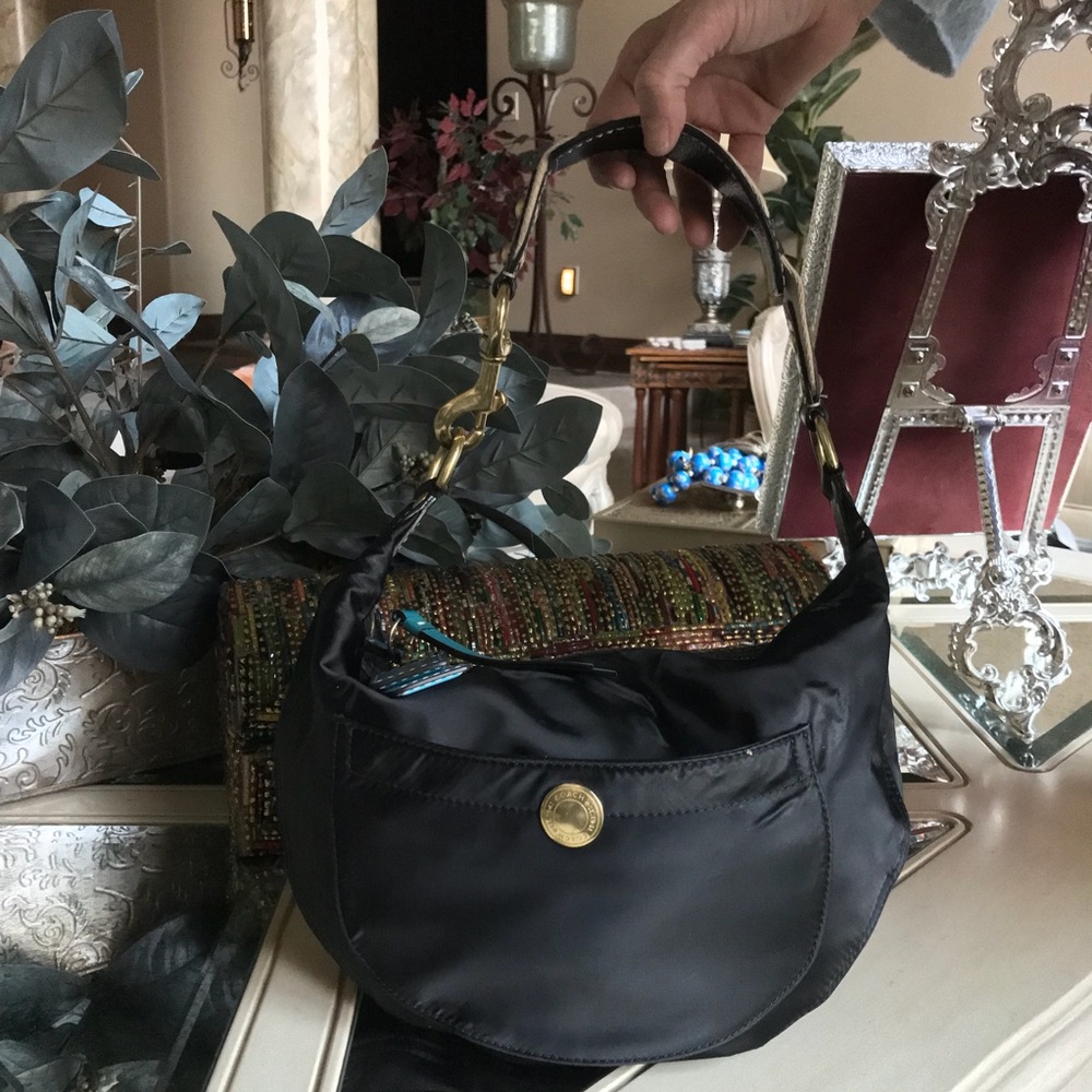 Black with turquoise. Excellent condition